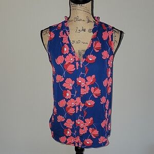 Multicolored sleeveless blouse with v-neck and ruffled details